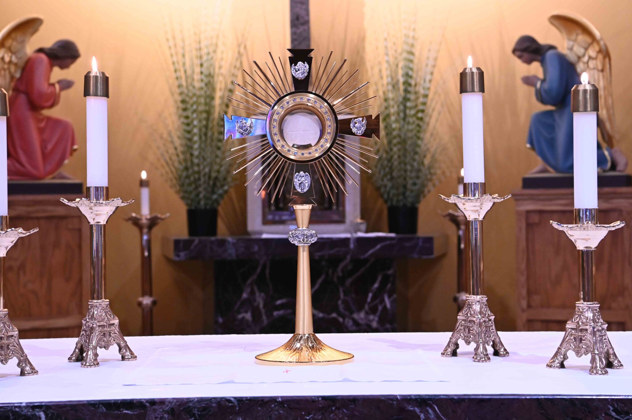 The Blessed Sacrament exposed in a golden monstrance for Eucharistic Adoration
